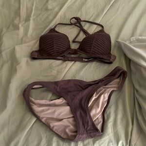 Purple swimsuit 2 piece 
If you want one or the other lmk !